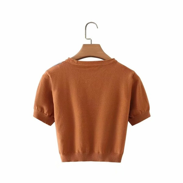 Lühike ruuduline vest nööpide ja lühikeste varrukatega