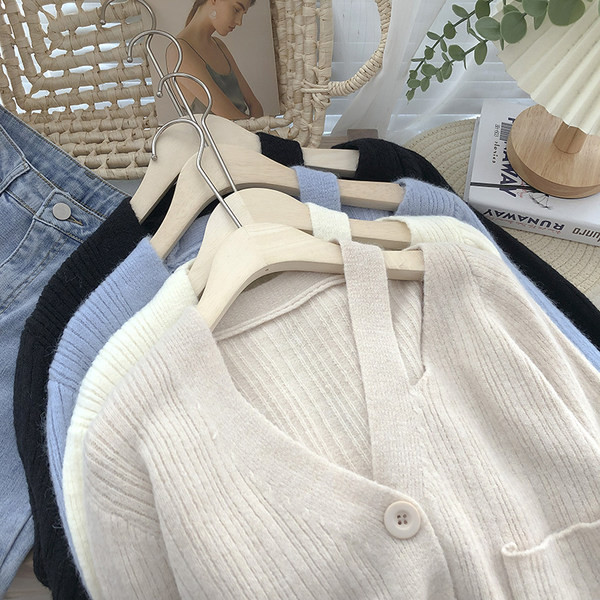 Lühikese mudeliga naiste kardigan taskutega