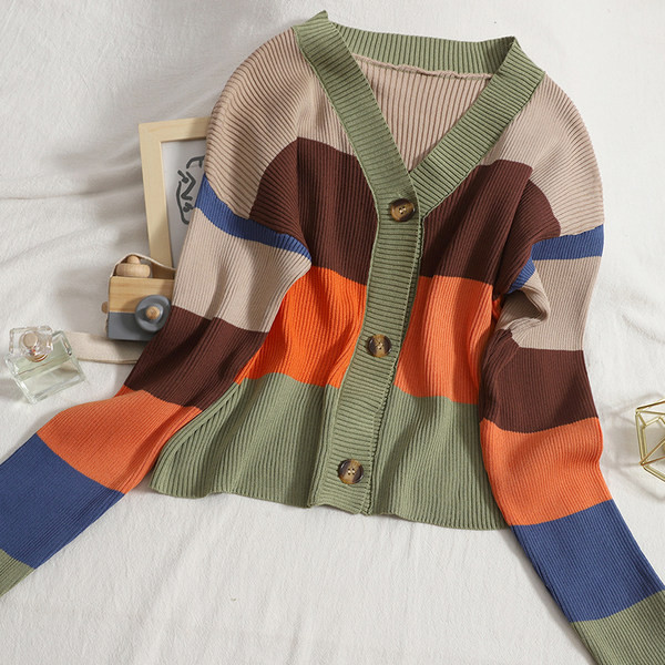 Alkalmi női mellény spitz nyakkivágással és kerek gombokkal