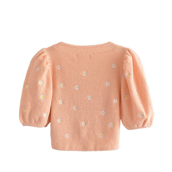 Lühike kootud vest lilltikandi ja spitsikaelusega