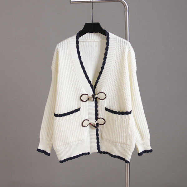 Taskute ja pikkade varrukatega naiste kampsun