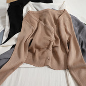 Modern mellény kerek nyakkivágással és hosszú ujjakkal