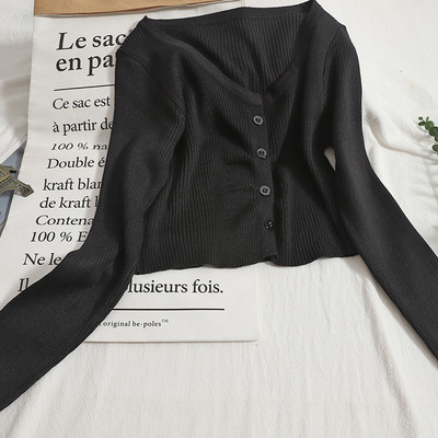 Modern mellény kerek nyakkivágással és hosszú ujjakkal