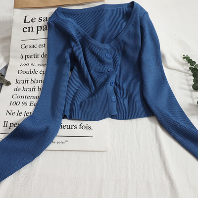 Modern mellény kerek nyakkivágással és hosszú ujjakkal