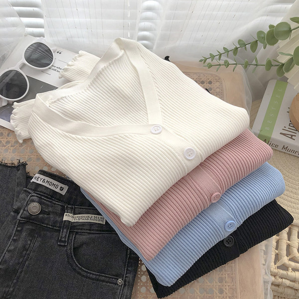 Ühevärviline mudel naiste velvetist nööpidega