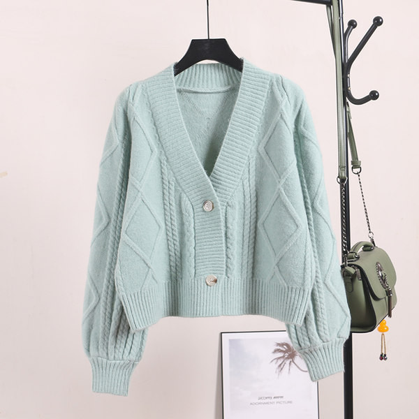 Naiste kaasaegne vest nööpide ja sügava kaelusega