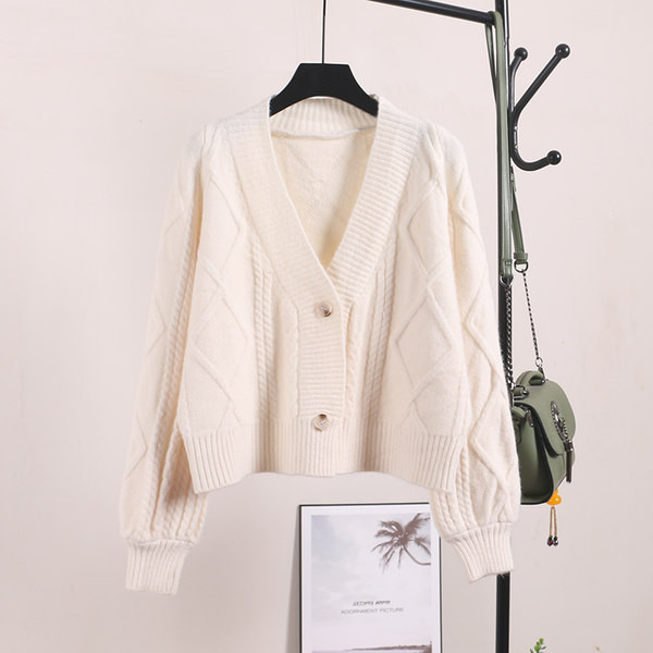 Naiste kaasaegne vest nööpide ja sügava kaelusega