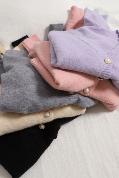 Moodne naiste ühevärviline vest spitsikaelusega ja pikkade varrukatega