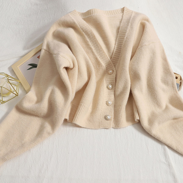 Moodne naiste ühevärviline vest spitsikaelusega ja pikkade varrukatega