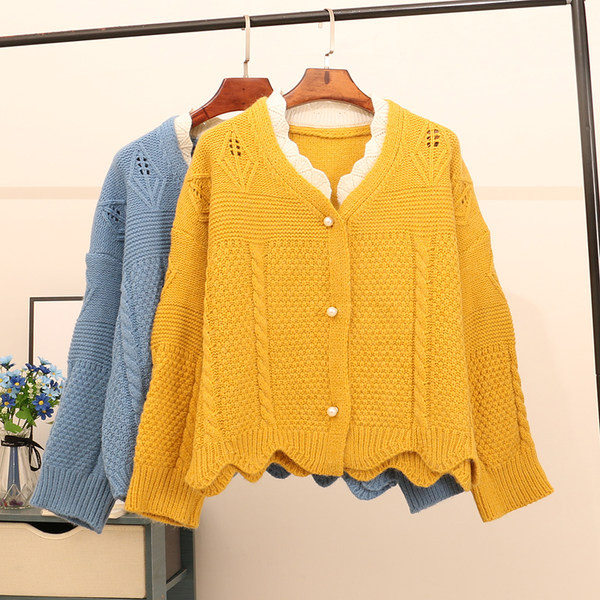 Vesta moderna de dama cu nasturi