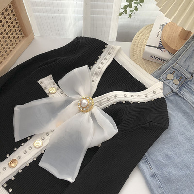 Γυναικεία ζακέτα διακοσμημένη με πέτρες και κορδέλα