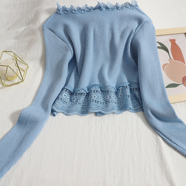 Moodne naiste vest mitmes värvitoonis ovaalse kaelusega