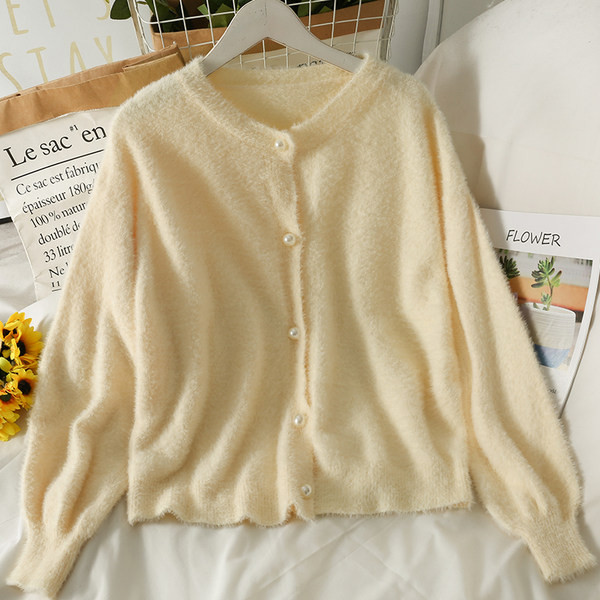 Vesta de puf de dama potrivita pentru toamna