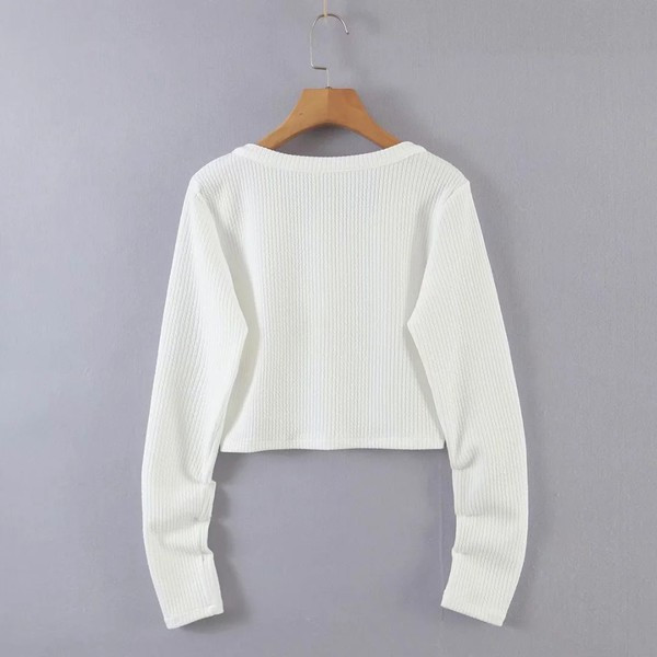 Lühike velvetist vest nööpide ja pikkade varrukatega