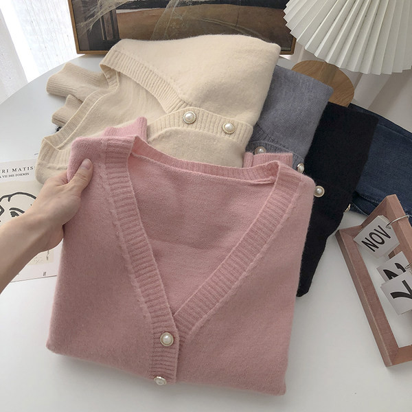 Naiste vest pärlite ja spitsikaelusega