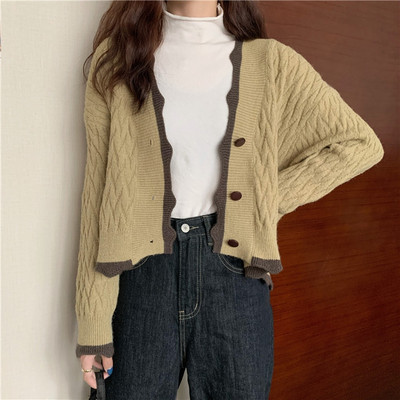 Naiste vest spits-kaelusega taskute ja nööpidega