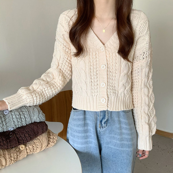 Naiste spitsikaelus ja nööpidega tavaline kampsun