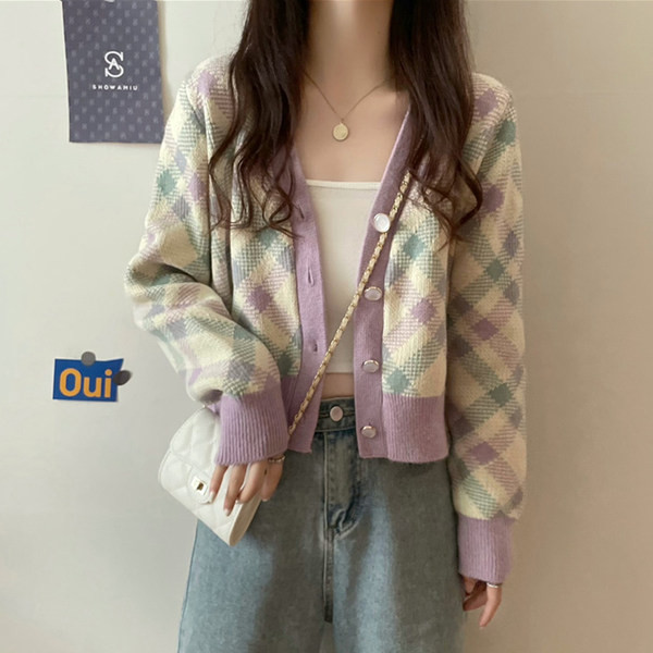 Naiste ruuduline vest nööpide ja spitsikaelusega