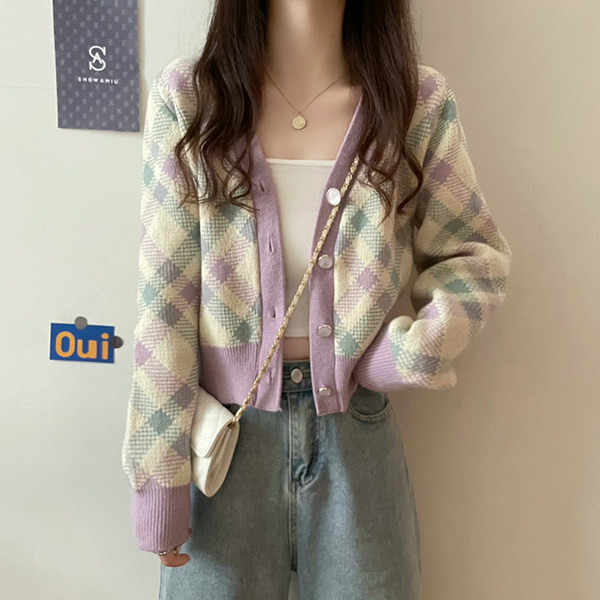 Naiste ruuduline vest nööpide ja spitsikaelusega