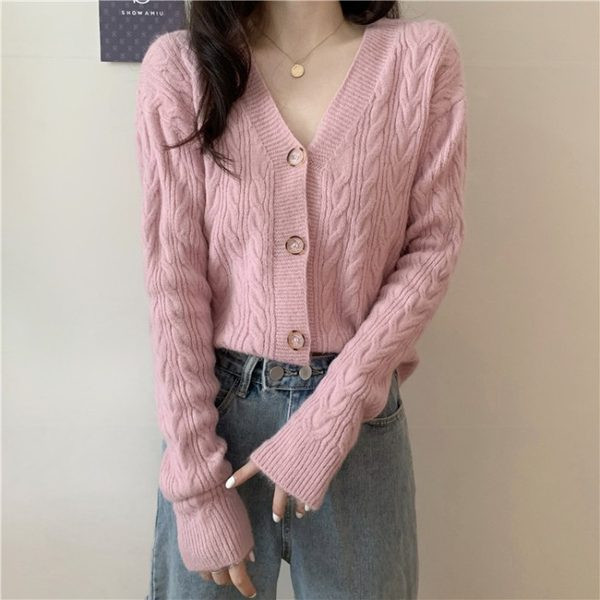 Kaasaegne vest spits-kaelusega ja nööpidega tavaline mudel