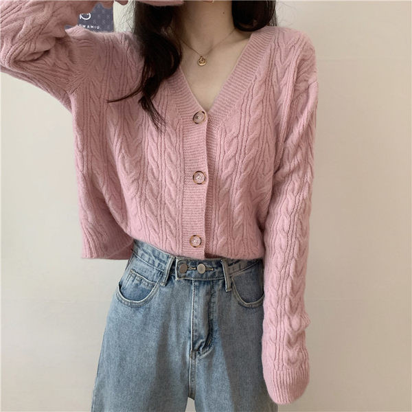 Kaasaegne vest spits-kaelusega ja nööpidega tavaline mudel