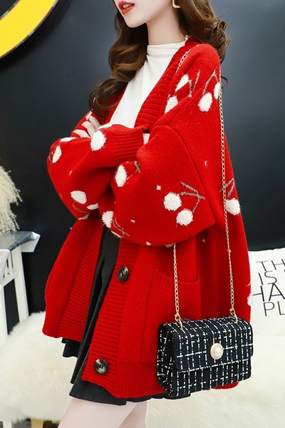 Praegune naiste kampsun laia tikandiga mudel