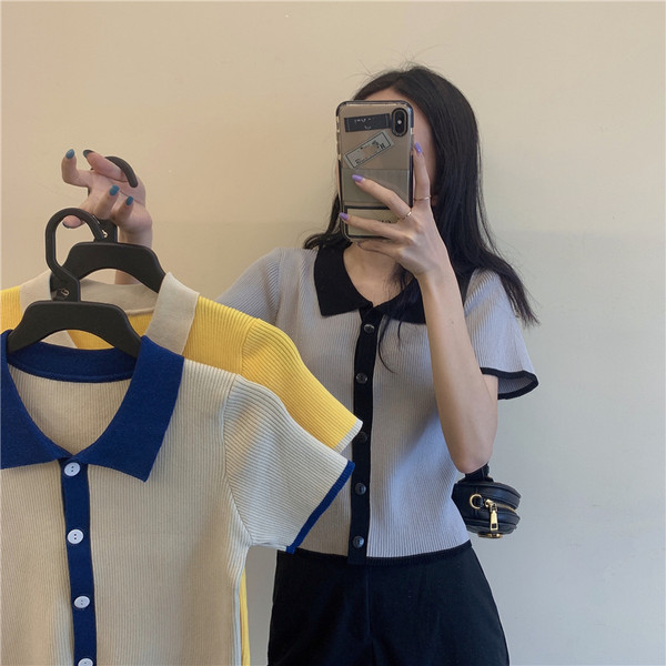 Praegune naiste vesti lihtne mudel lühikeste varrukatega