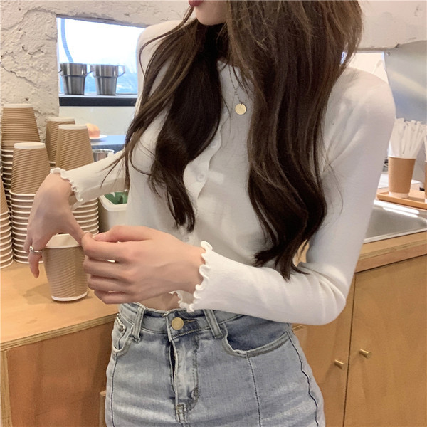 Praegune naiste kampsun nööpidega lühike mudel