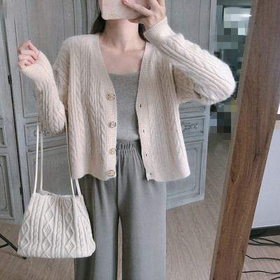 Γυναικεία ζακέτα με spitz λαιμόκοψη και κουμπιά φαρδύ μοντέλο