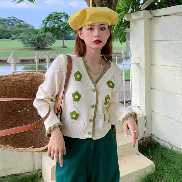 Moodne naiste nööpide ja spitsikaelusega vest