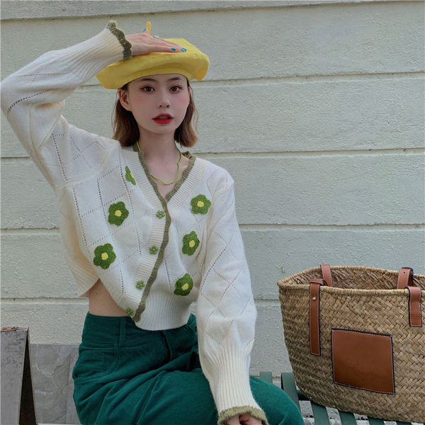 Moodne naiste nööpide ja spitsikaelusega vest