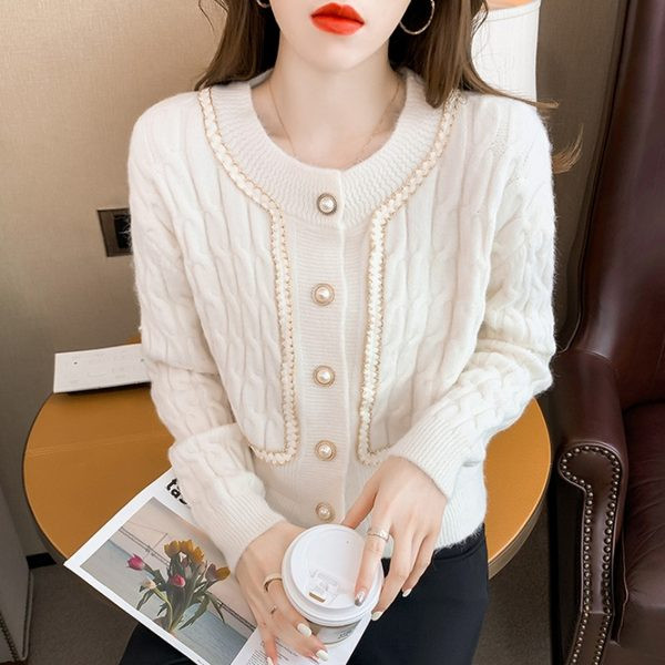 Stiilne naiste vest ümara kaelusega, pikkade varrukate ja nööpidega