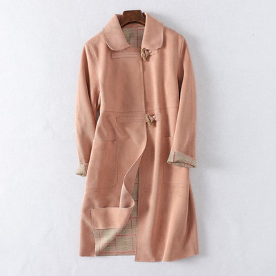 Hosszú őszi kabát zsebekkel