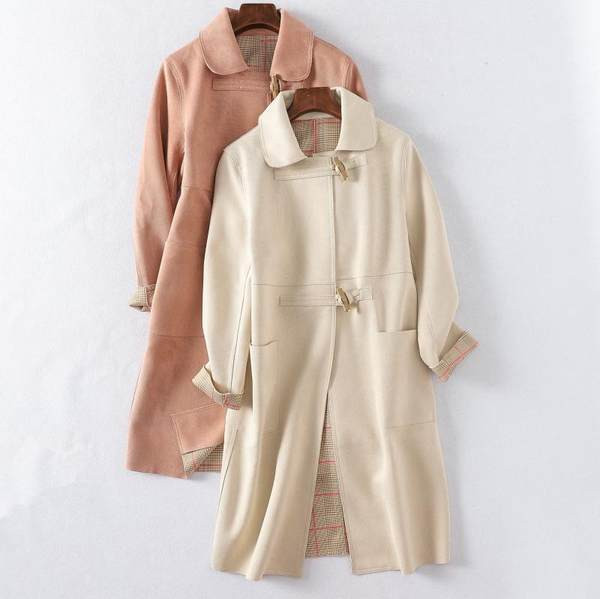 Hosszú őszi kabát zsebekkel