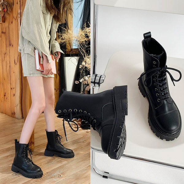 Musta värvi krobelise tallaga nahast lastesaapad