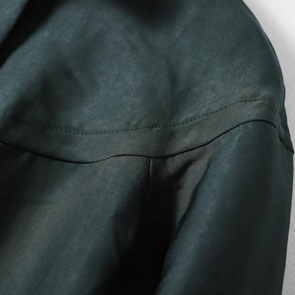 Pika sügismantli lai taskutega mudel