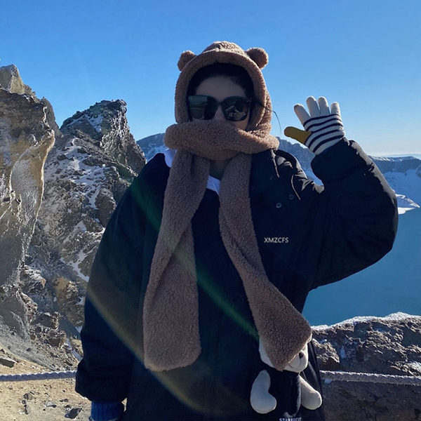 Modern női hosszú kabát széles modell kapucnival