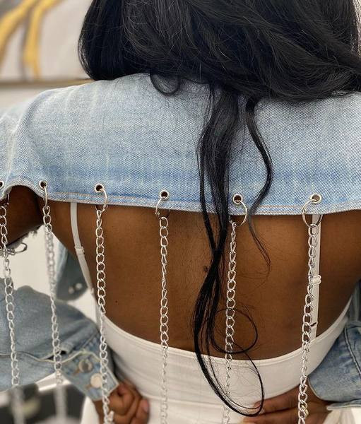 Praegune naiste teksajaki metallelementidega lühike mudel