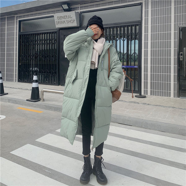 Modern női hosszú kabát cipzárral és kapucnival