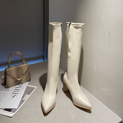 Stiilsed naiste saapad, teravatipuline kõrge kontsaga mudel