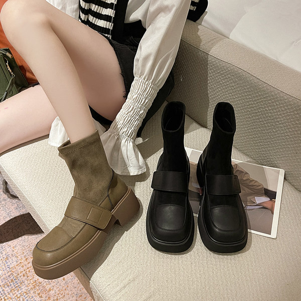 Naiste pruunid ja mustad nahast saapad