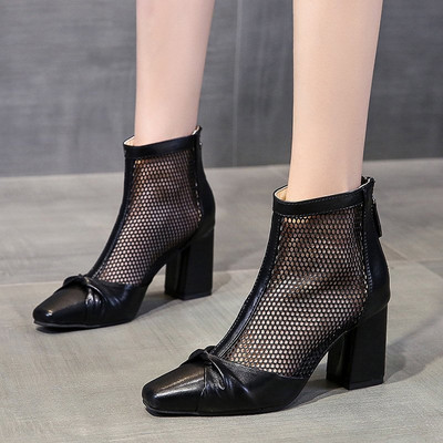 Eko bőrből készült modern női csizma vastag sarokkal