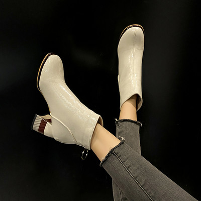 Stiilsed paksu kontsa ja lukuga naiste saapad