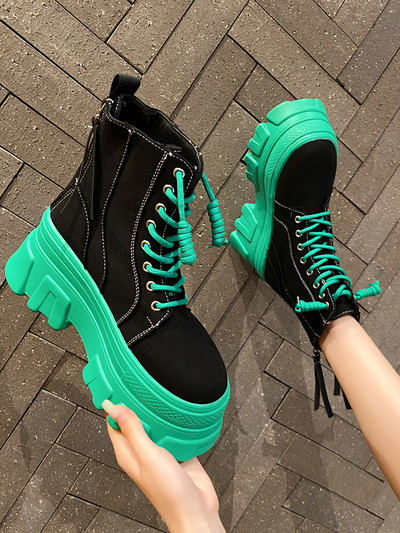 Women`s modern boots with high soles and laces