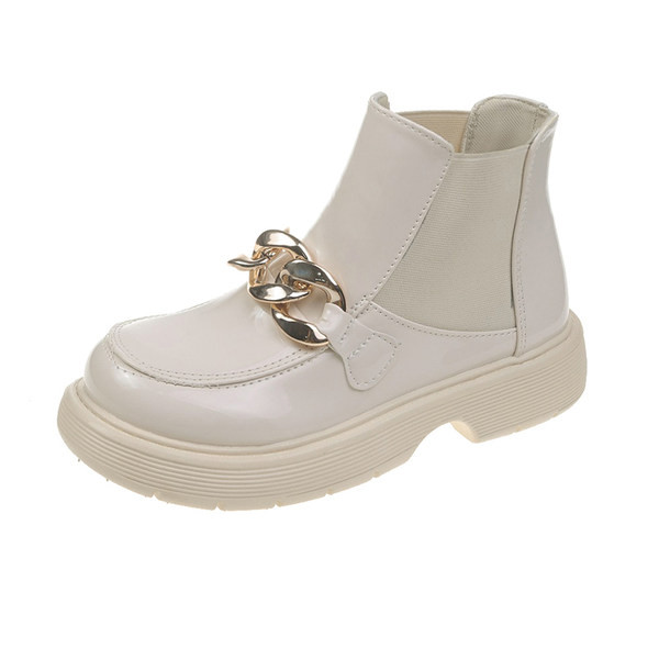 Bőr női csizma fém díszítéssel