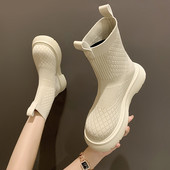 Textilből készült, lapos talpú női csizma