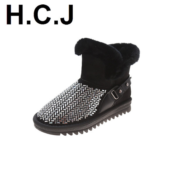 Kahes värvitoonis metallist kaunistuse ja sooja voodriga naiste saapad