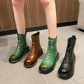 Praegused paelte ja lukuga ökonahast saapad