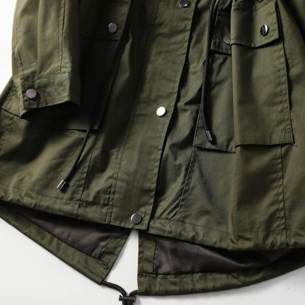 Pikk sügisene parka jope vöökohal lipsudega