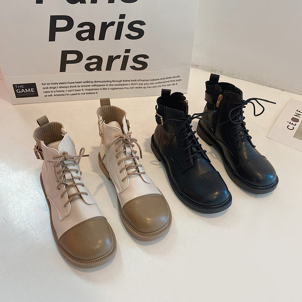 Nahast naiste saapad paelte ja lameda tallaga